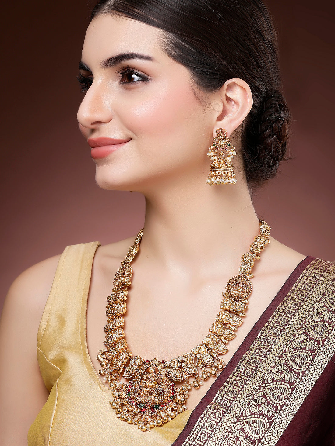 Karatcart Gold Plated Laxmi Mata and Peacock Design Long Rani Haar Temple Jewellery Set for Women