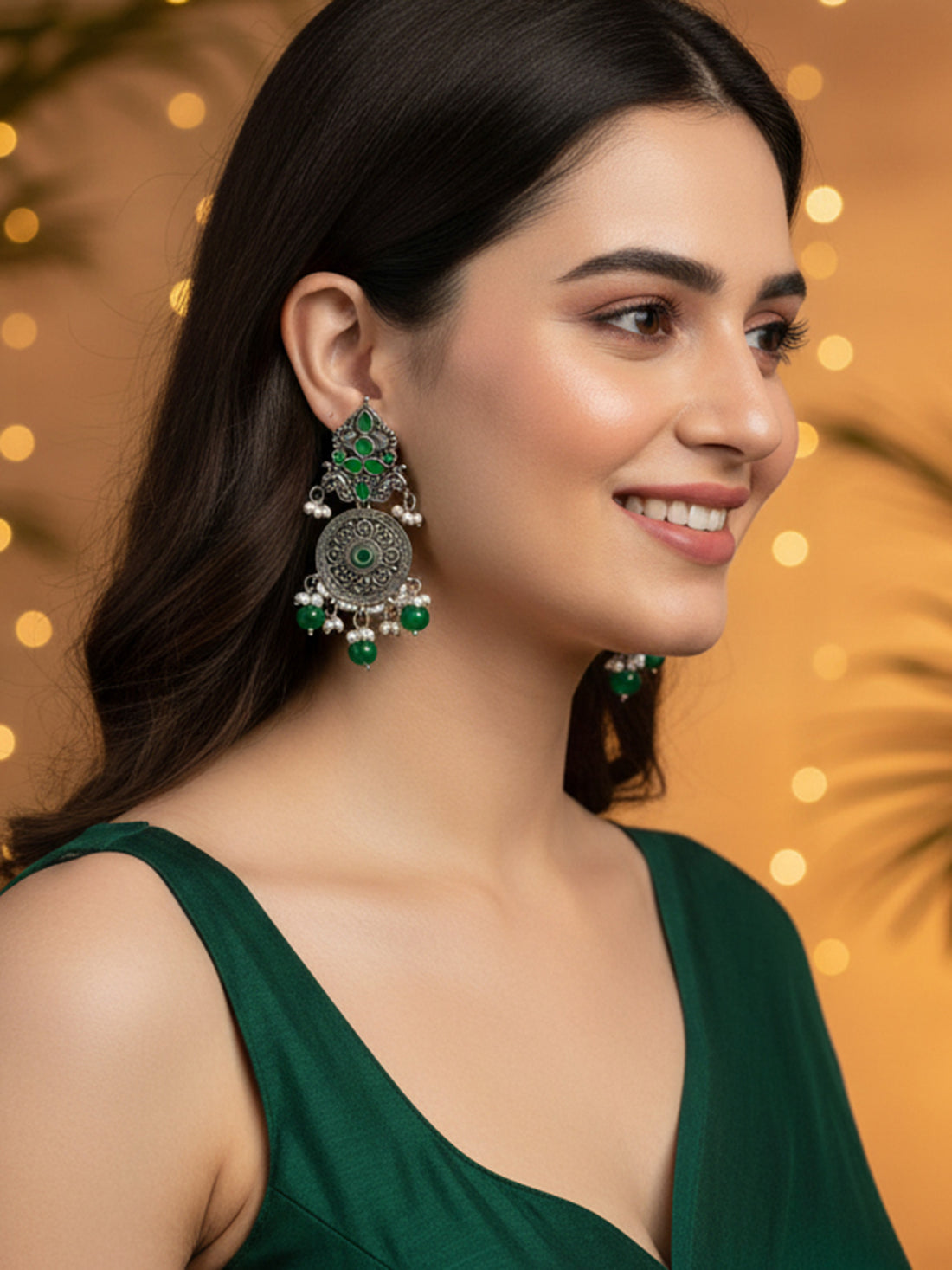 Karatcart Oxidised Silver Green Stone Chakra Design Dangler Earrings for Women