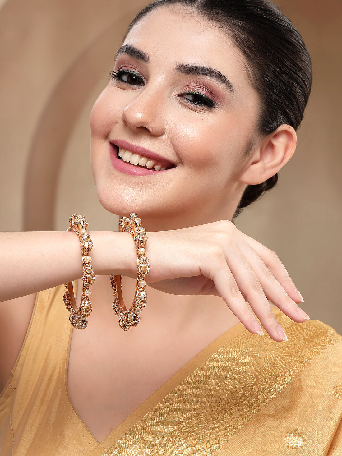 KARATCART Set of 2 Gold-Plated Elephant Design Bridal Bangles for Women