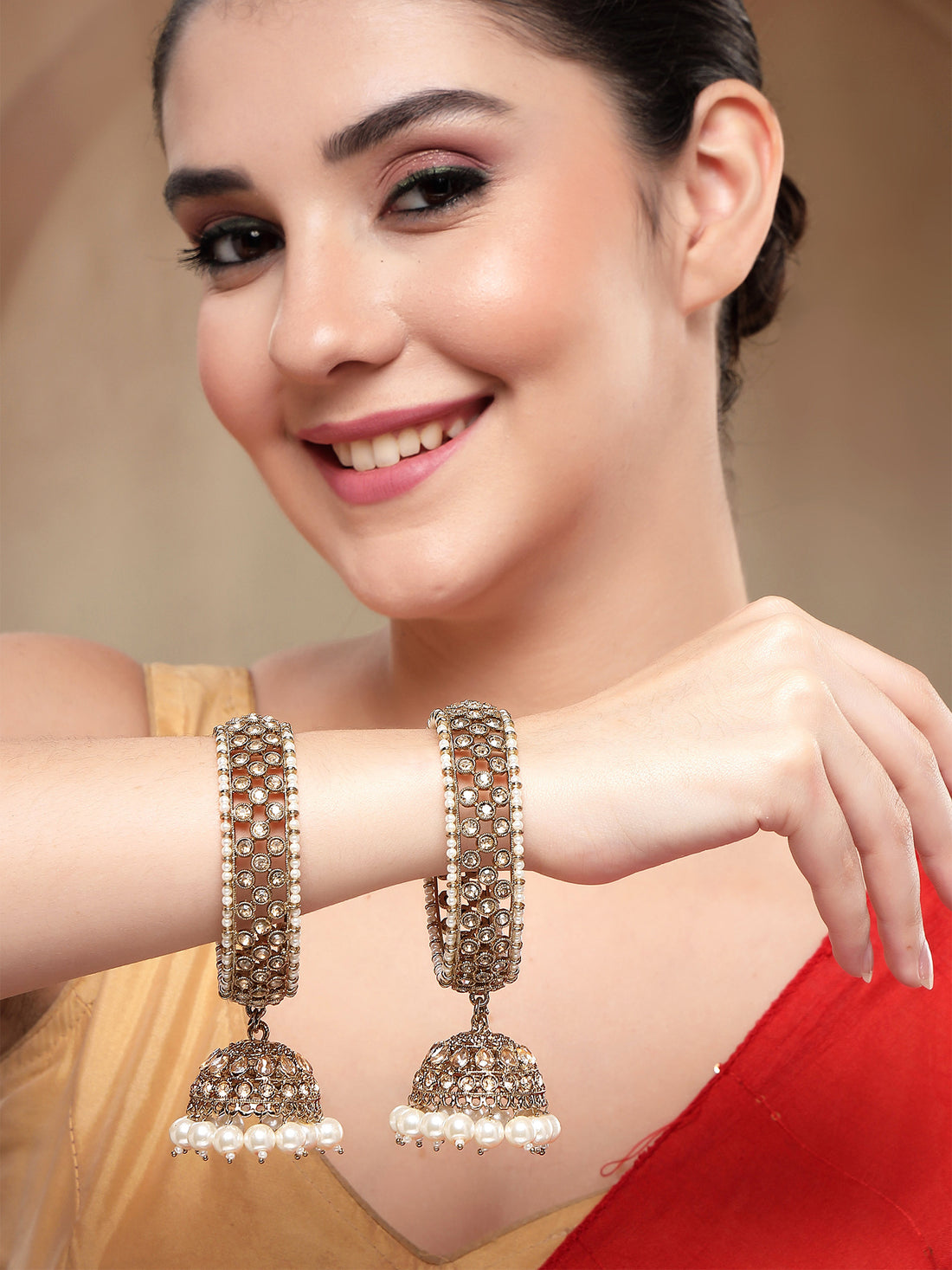 KARATCART Antique Gold-Plated Jhumka Studded Bridal Bangles for Women