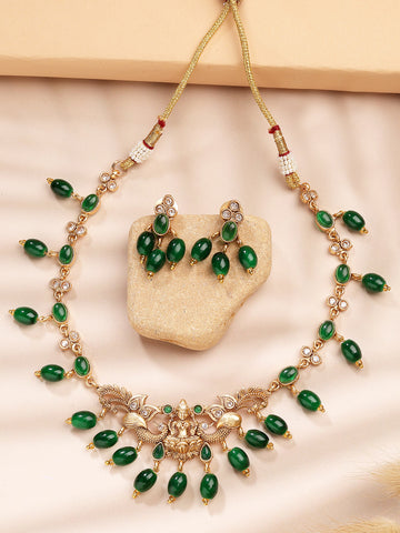 Karatcart Green Tumble Stone Gold Plated Laxmi Mata Temple Jewellery Set for Women