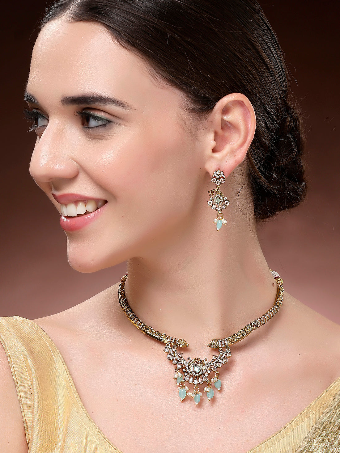 Karatcart Dazzling Light Blue Tumble American Diamond Peacock Design Necklace Set for Women