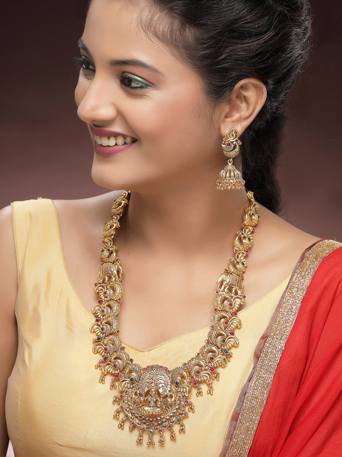 KARATCART Traditional Gold-Plated Laxmi Mata and Peacock Rani Haar Temple Jewellery Set for Women