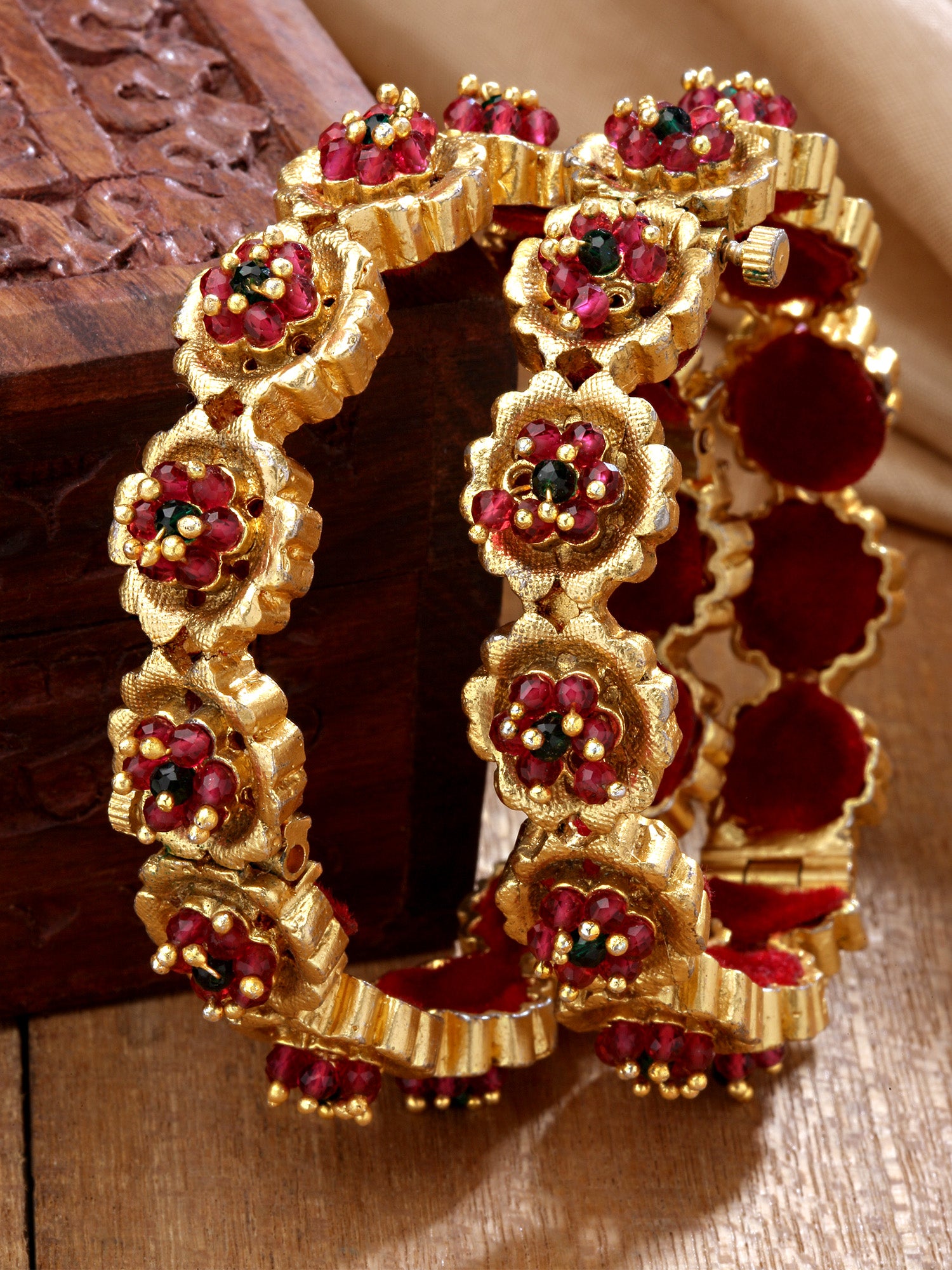 Karatcart Gold Plated Red Crystal Studded Floral Rajwadi Temple Bangle