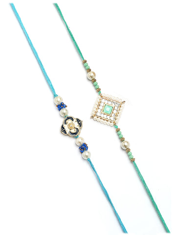Karatcart Set of 4 Blue and White Enamel Floral Design Kundan Rakhi for Brother with Roli & Chawal
