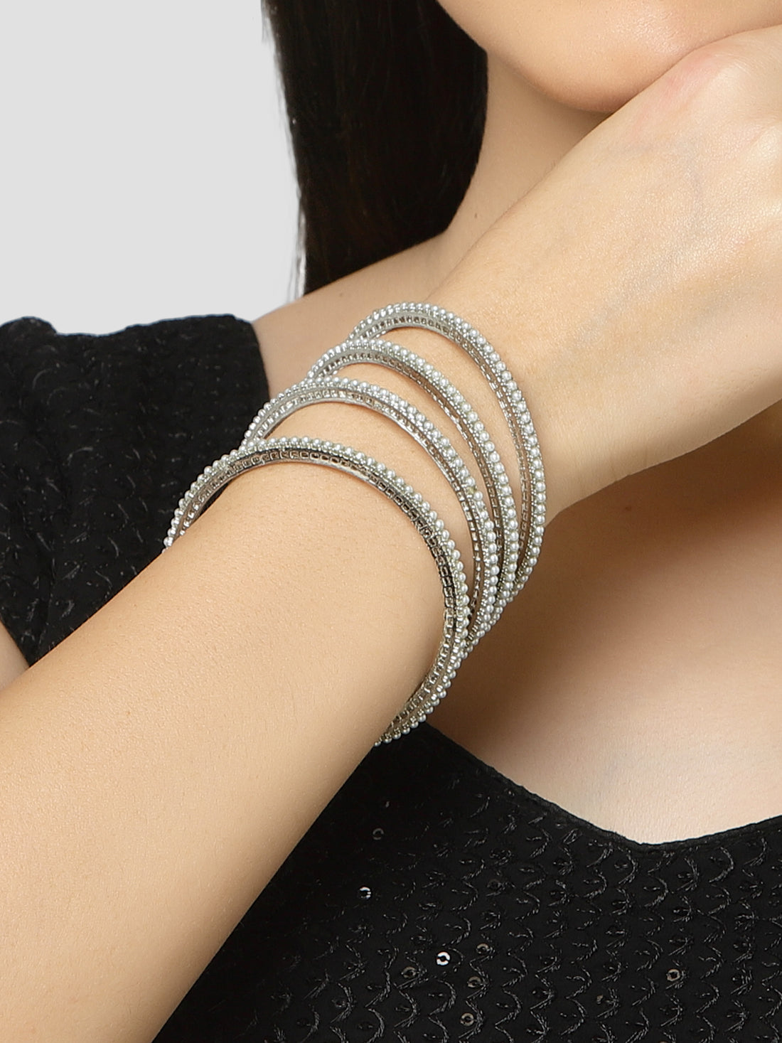 Karatcart Oxidised Silver Pearl Studded Tribal Set of 4 Bangles for Women