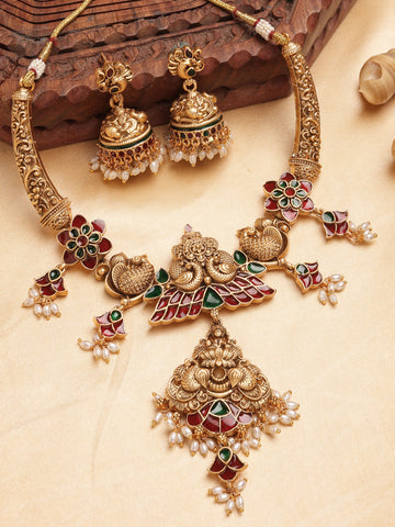 Karatcart Gold Plated Engraved Laxmi Mata and Peacock Necklace Set for Women
