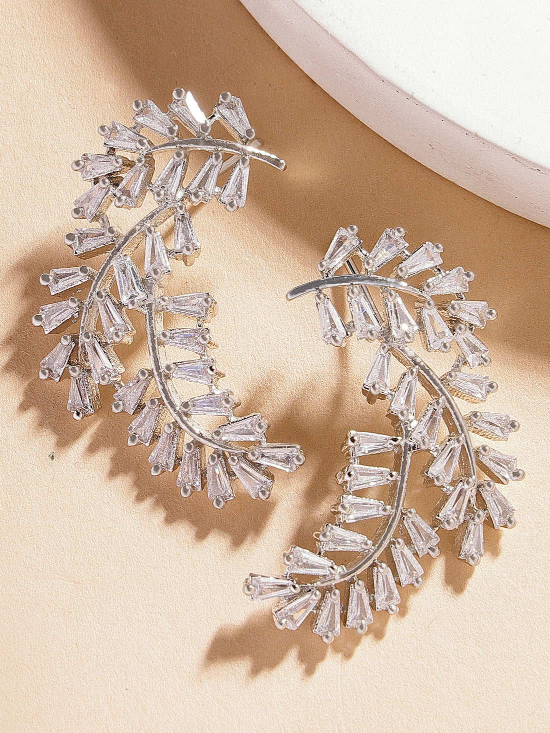 Karatcart Silver Tone Leaf Shape AD Studs for Women