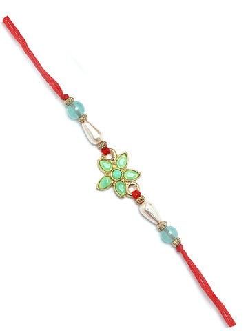Karatcart Gold Plated Light Blue Floral Kundan Bhiya Rakhi with Roli & Chawal