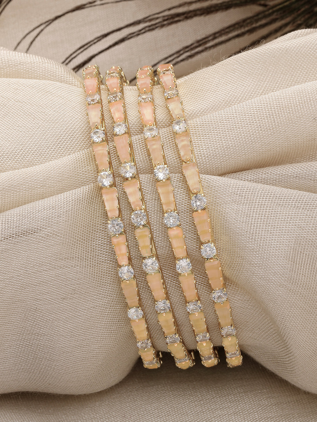 Karatcart Gold Plated Set of 4 Pink American Diamond Bangles for Women