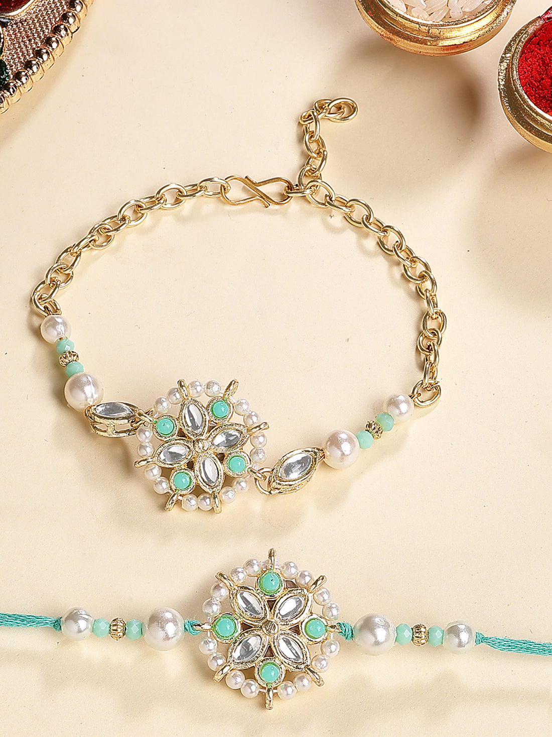 Karatcart Gold Plated Light Blue Beads Floral Kundan Bhiya Bhabhi Rakhi with Roli & Chawal