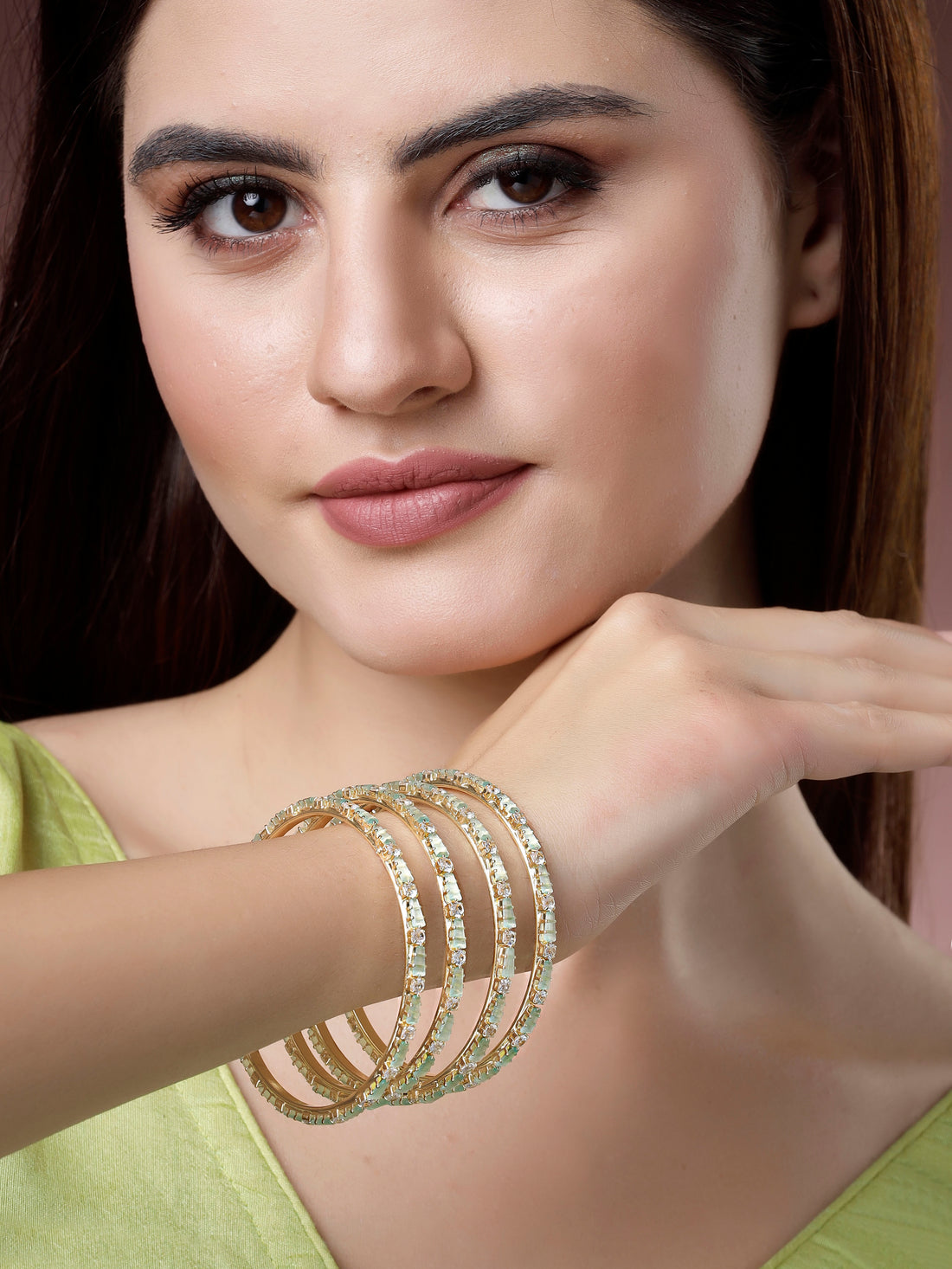 Karatcart Set of 4 Gold Plated Lime Green CZ Studded Bangles for Women