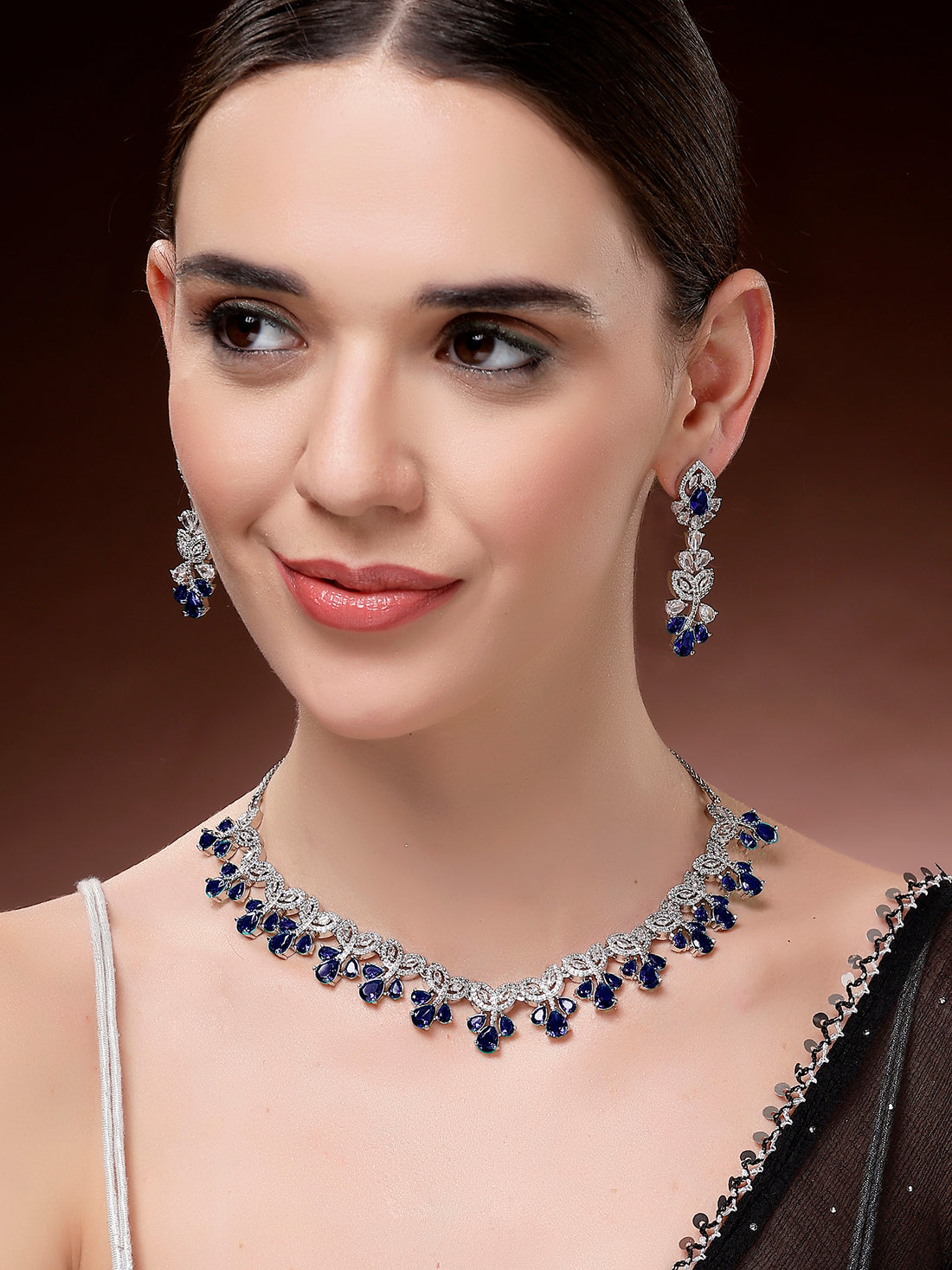 Karatcart Sparkling Blue Floral American Diamond Silver Plated Necklace Set for Women