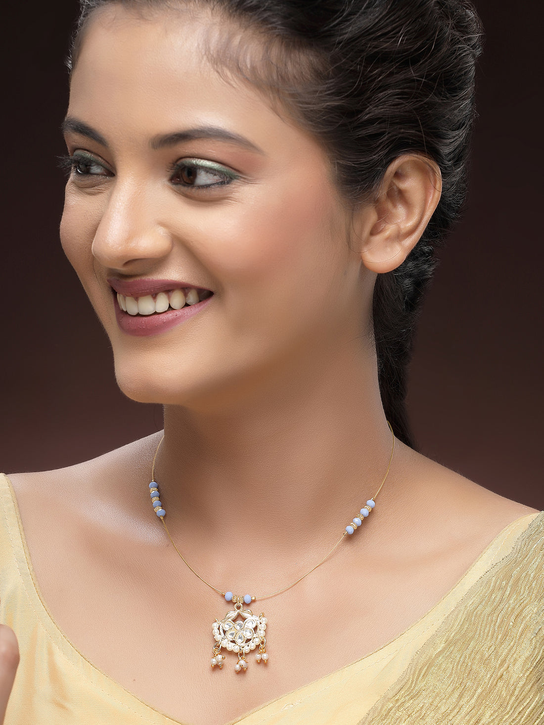 KARATCART Designer Gold-Plated Blue Crystal Floral Kundan Minimalist Necklace for Women