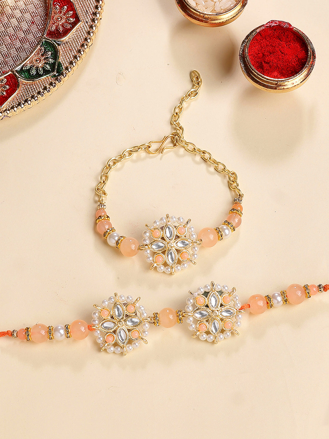 Karatcart Gold Plated Peach Beads Floral Kundan Bhiya Bhabhi Rakhi with Roli & Chawal