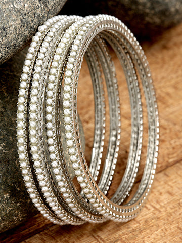 Karatcart Oxidised Silver Pearl Studded Tribal Set of 4 Bangles for Women