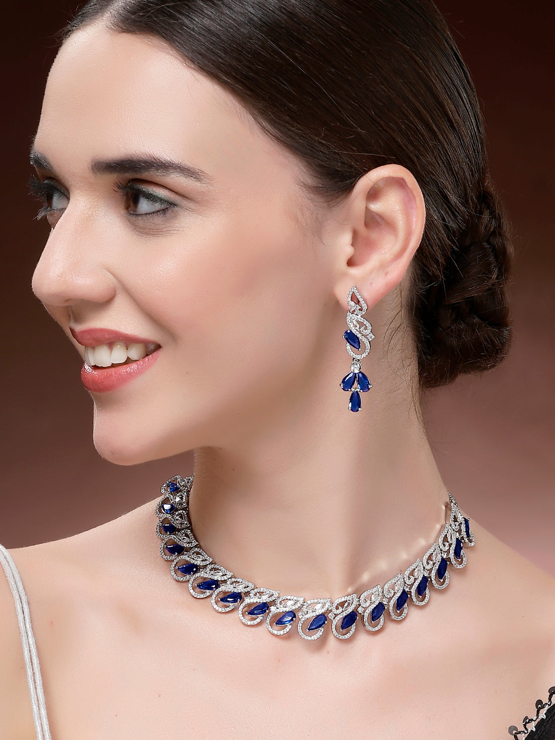 Karatcart Sparkling Blue Drop American Diamond Silver Plated Necklace Set for Women