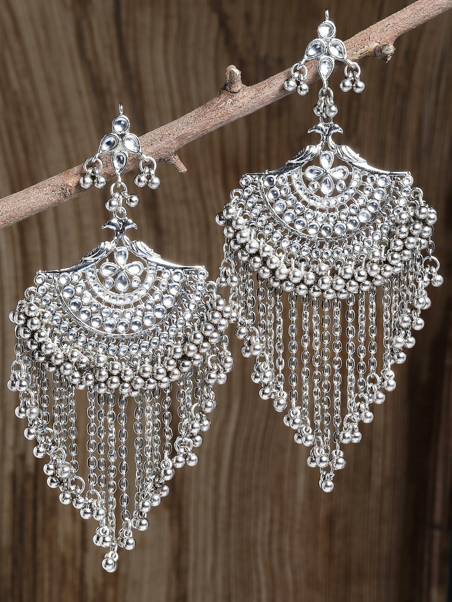 Karatcart Oxidised Silver White Kundan Chandbali Earrings with Tassels
