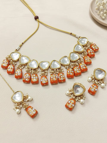 Gold-Plated Orange & White Polki Kundan-Studded & Pearl Beaded Handcrafted Jewellery Set