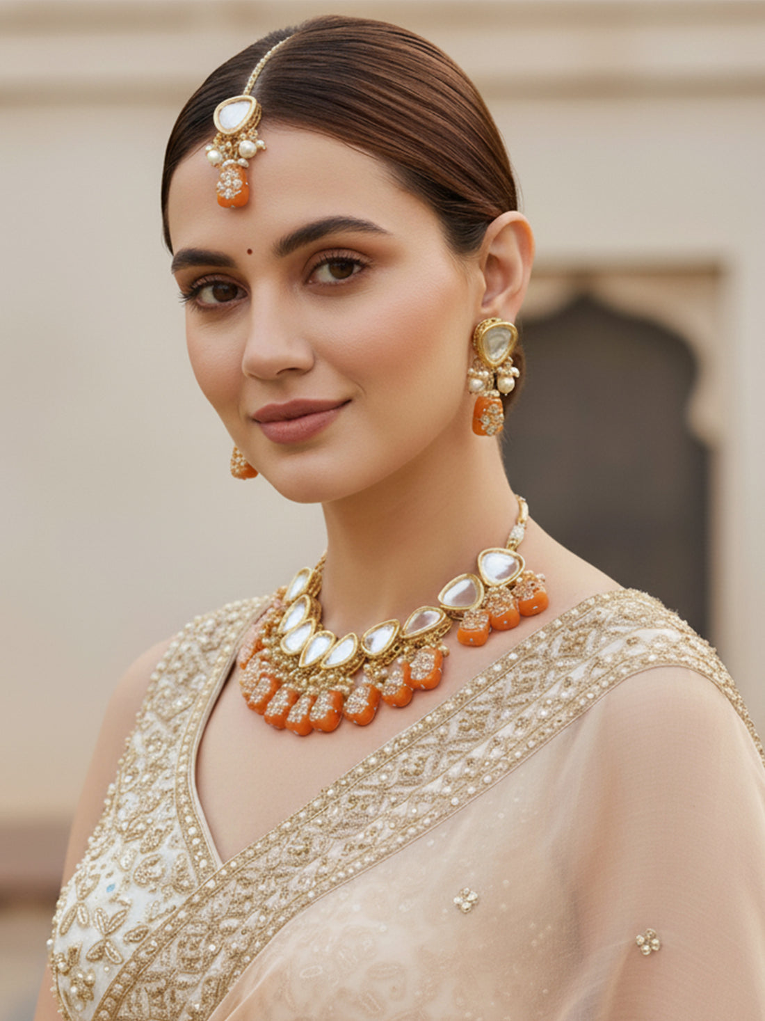 Gold-Plated Orange & White Polki Kundan-Studded & Pearl Beaded Handcrafted Jewellery Set