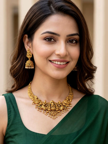 KARATCART Traditional Gold-Plated Goddess Lakshmi and Peacock Motifs Temple Jewellery Set for Women