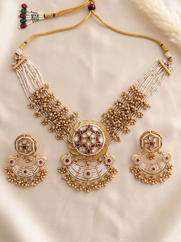 KARATCART Traditional Gold-Plated Floral Red Kundan Pearl Beaded Jewellery Set for Women
