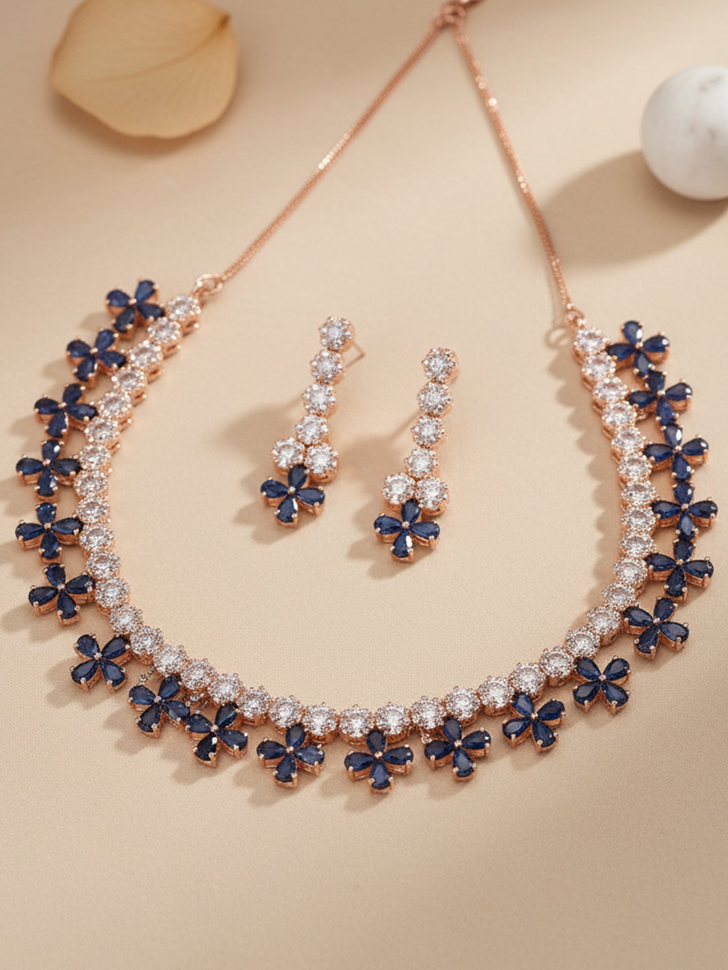 Karatcart Rose Gold Plated Blue Cubic Zirconia Studded Floral Design Necklace Set for Women