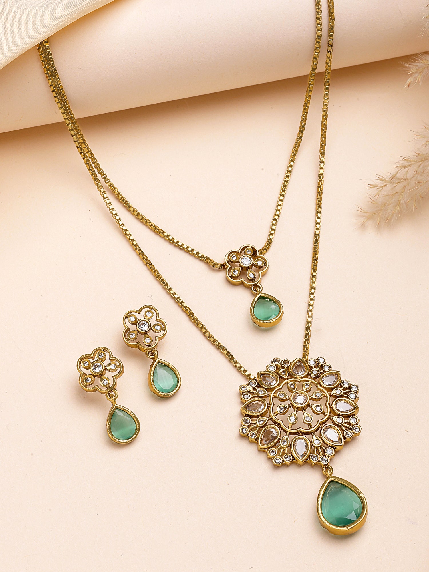 KARATCART Traditional Dual-Layered Lime Green American Diamond Pendant Jewellery Set for Women
