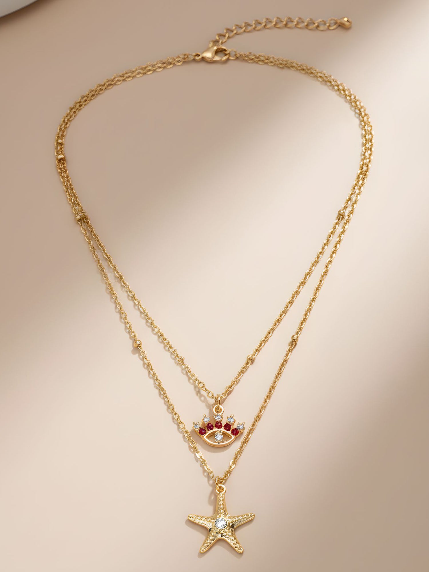 Bohey by KARATCART Gold Plated Star Fish and Star Multicharm Multilayered Chain Necklace for Women