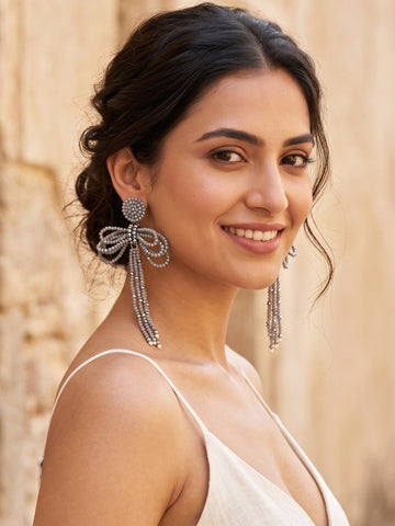 KARATCART Designer Grey Crystal Beaded Bow Shaped Long Dangler Earrings for Women