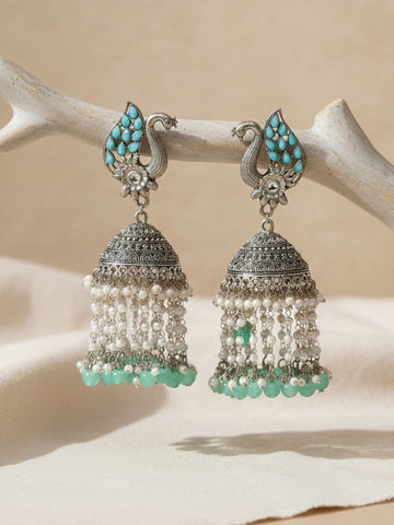 Karatcart Oxidised Silver Light Blue Kundan Peacock Jhumki Earrings for Women