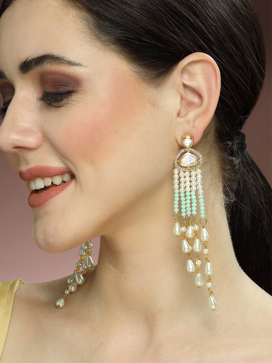 Karatcart Gold Plated Light Green Crystals Polki Kundan Tassel Earrings for Women