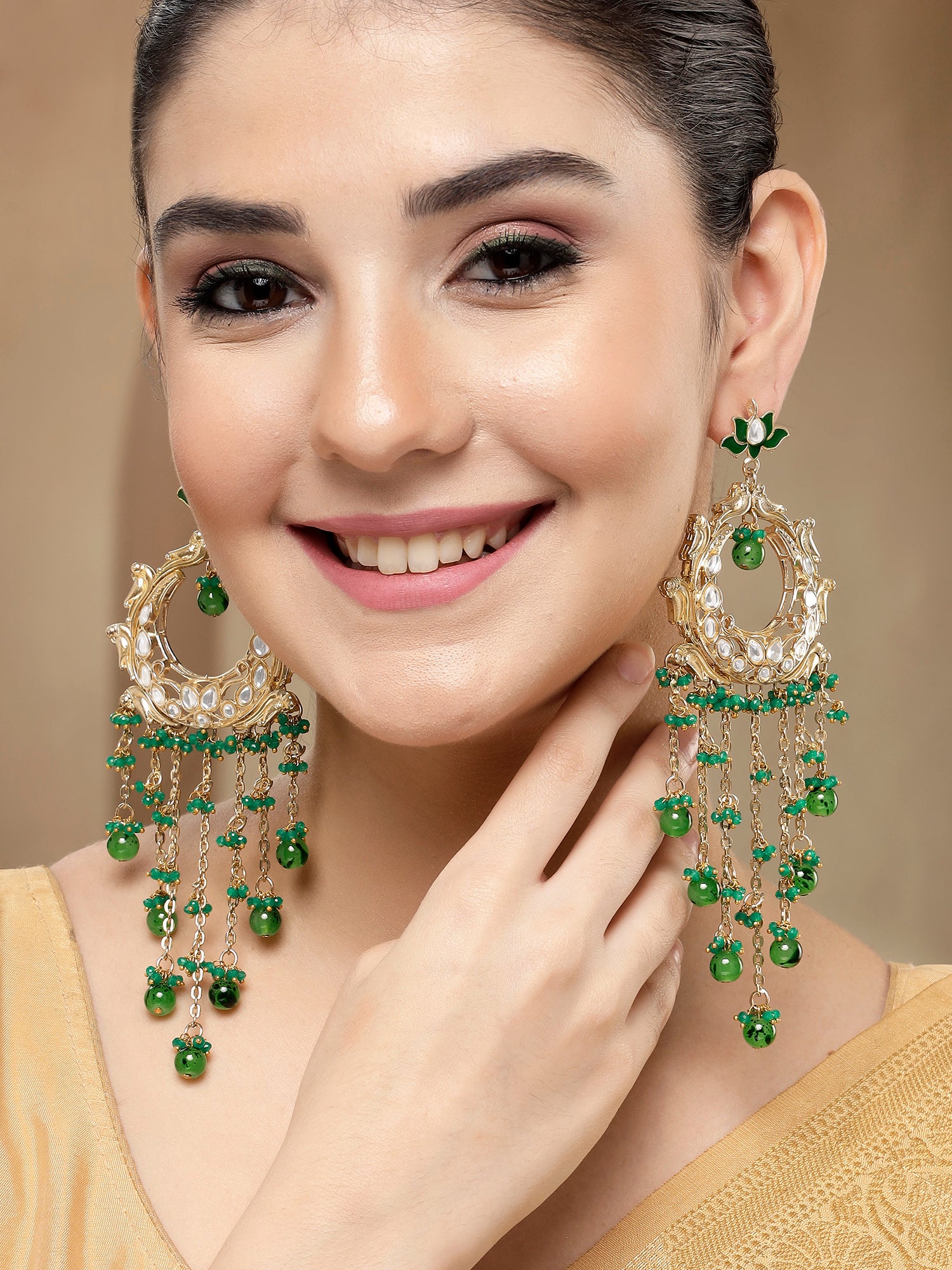 KARATCART Elegant Gold-Plated Green Beads and Crystal Kundan Tassel Earrings for Women - view 3