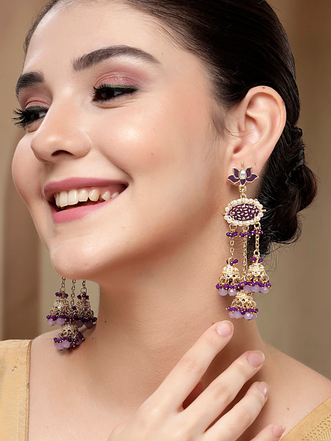 KARATCART Gold-Plated Purple Enamel Crystal-Studded Kundan Tassel Earrings for Women
