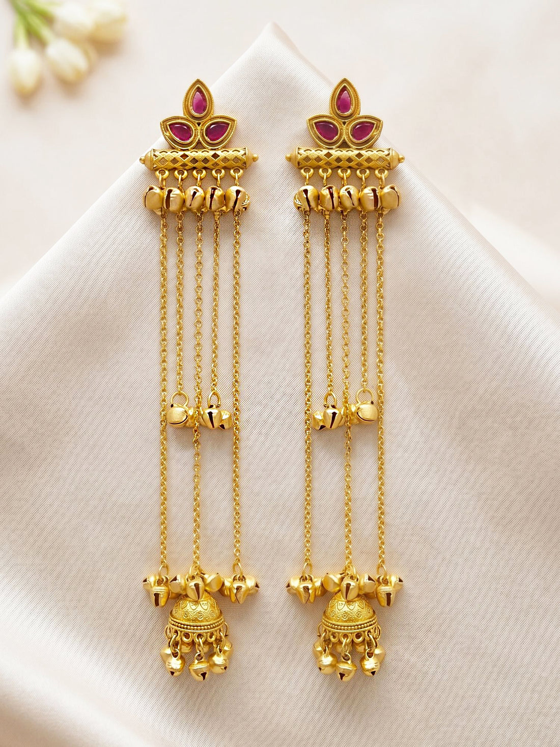 KARATCART Traditional Gold-Plated Pink Stone Leaf Motif Ghungroo Long Tassel Earrings for Women