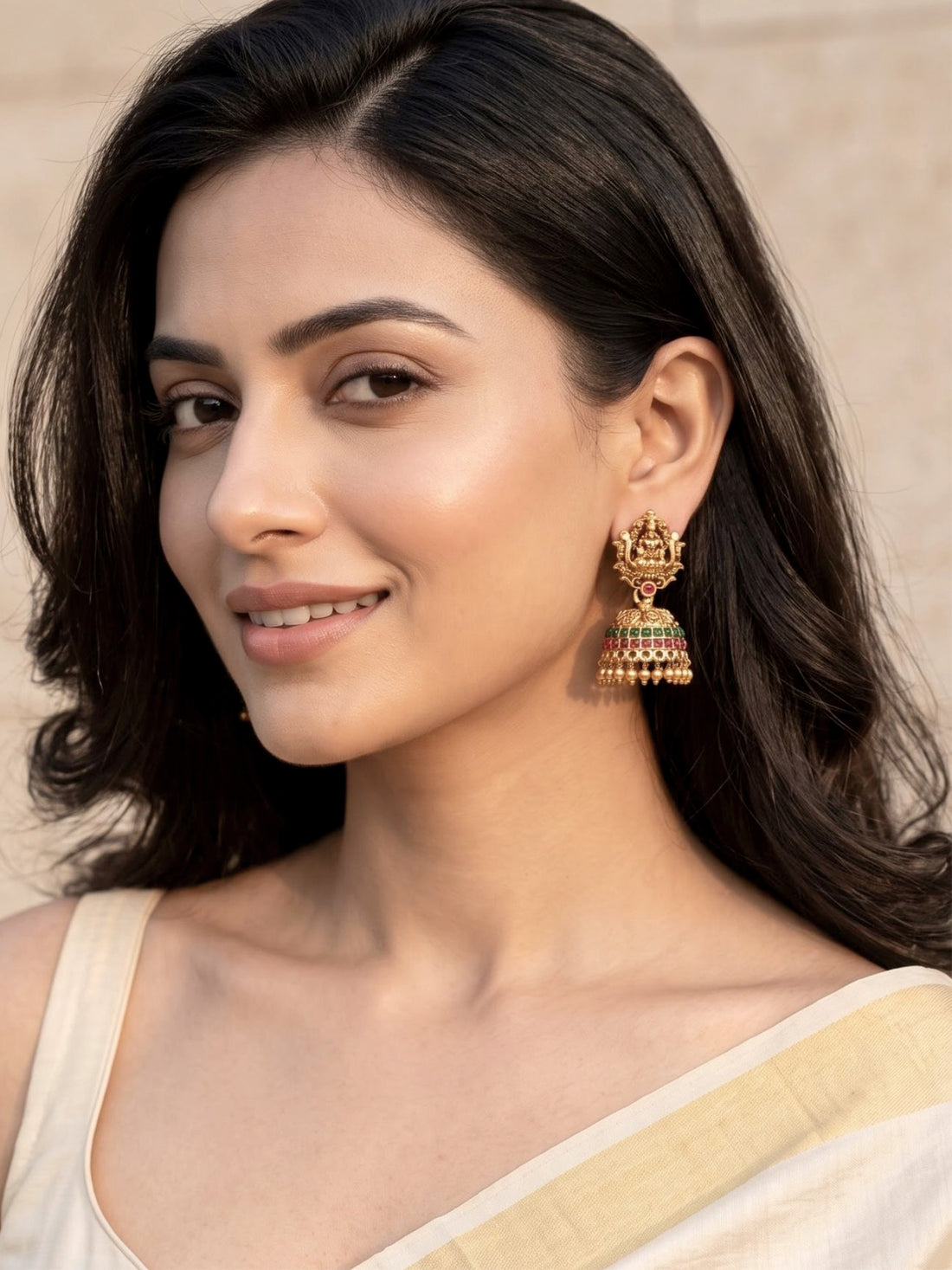 KARATCART Gold-Plated Mata Lakshmi Motif Red & Green Stone Jhumki Earrings for Women