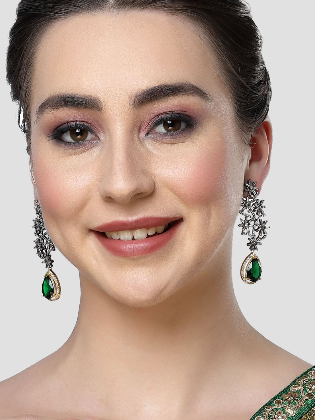 Karatcart Green Stone Studded Black Tone AD Earrings for Women