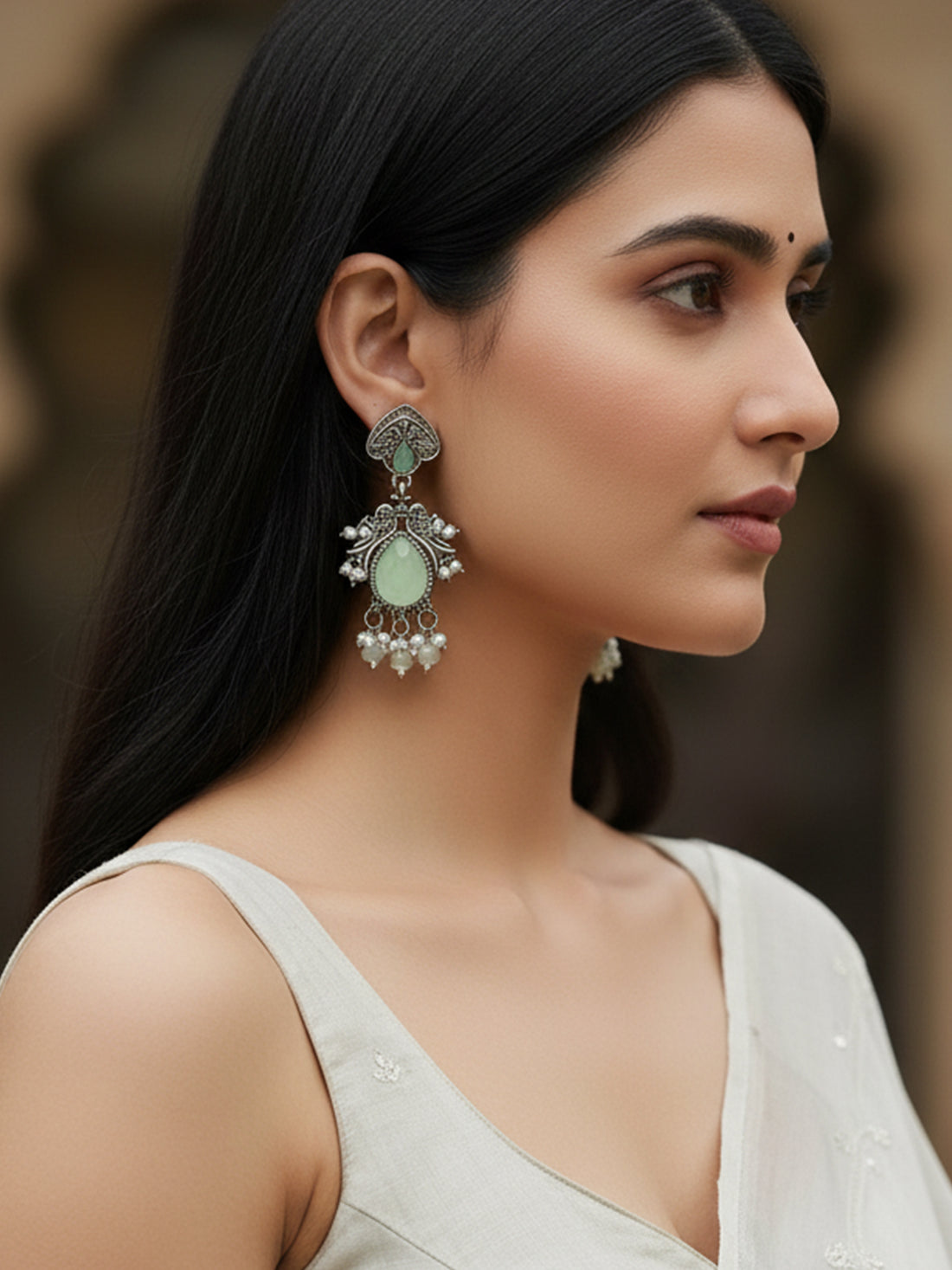 Karatcart Oxidised Silver Light Green Carved Stone Drop Earrings for Women