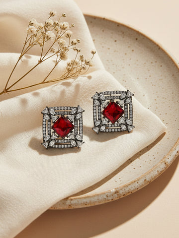 Karatcart Black Silver Plated Red Stones AD Stud Earrings for Women