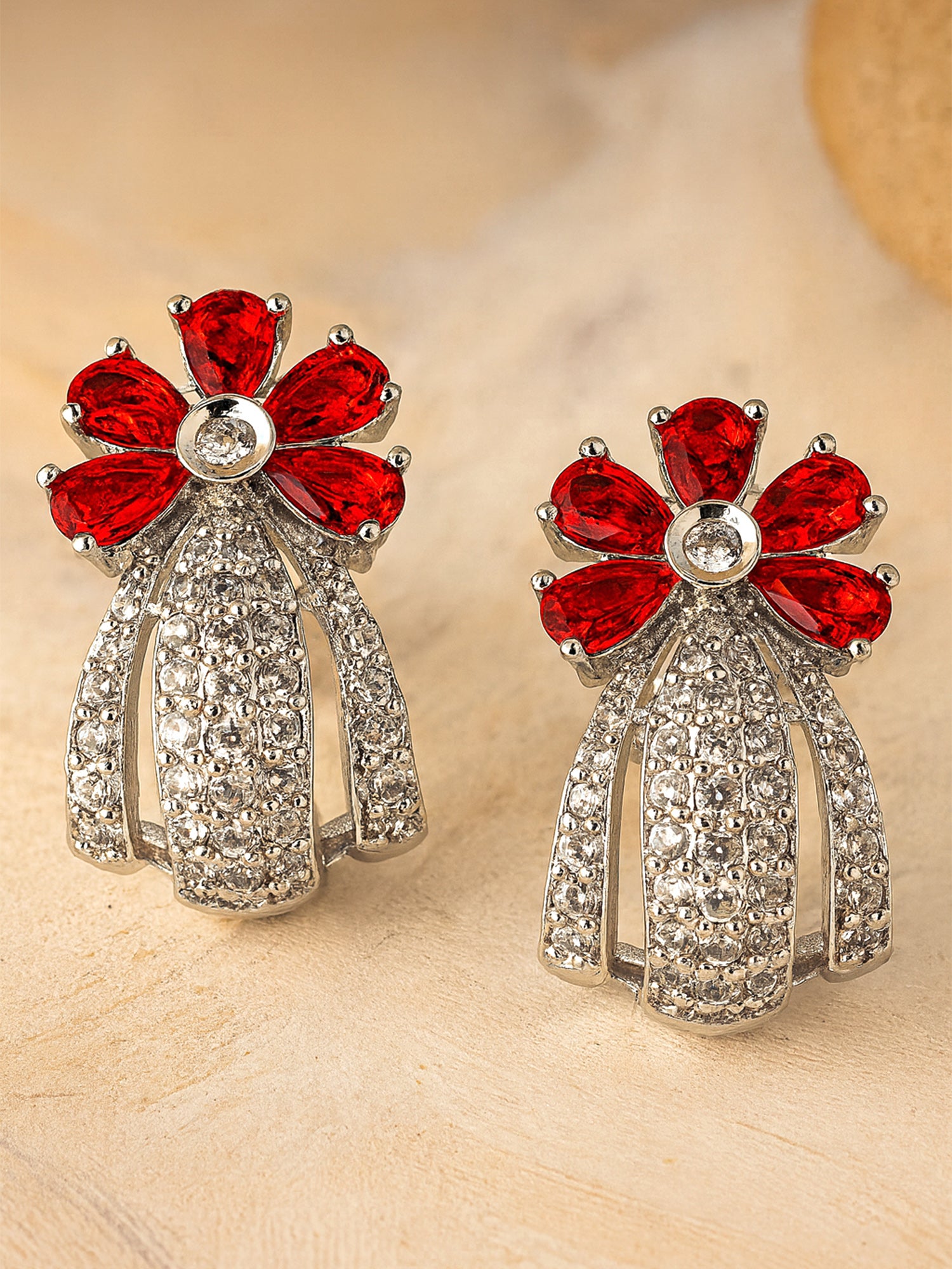 Karatcart Silver Plated Red Stones Floral Design AD Stud Earrings for Women
