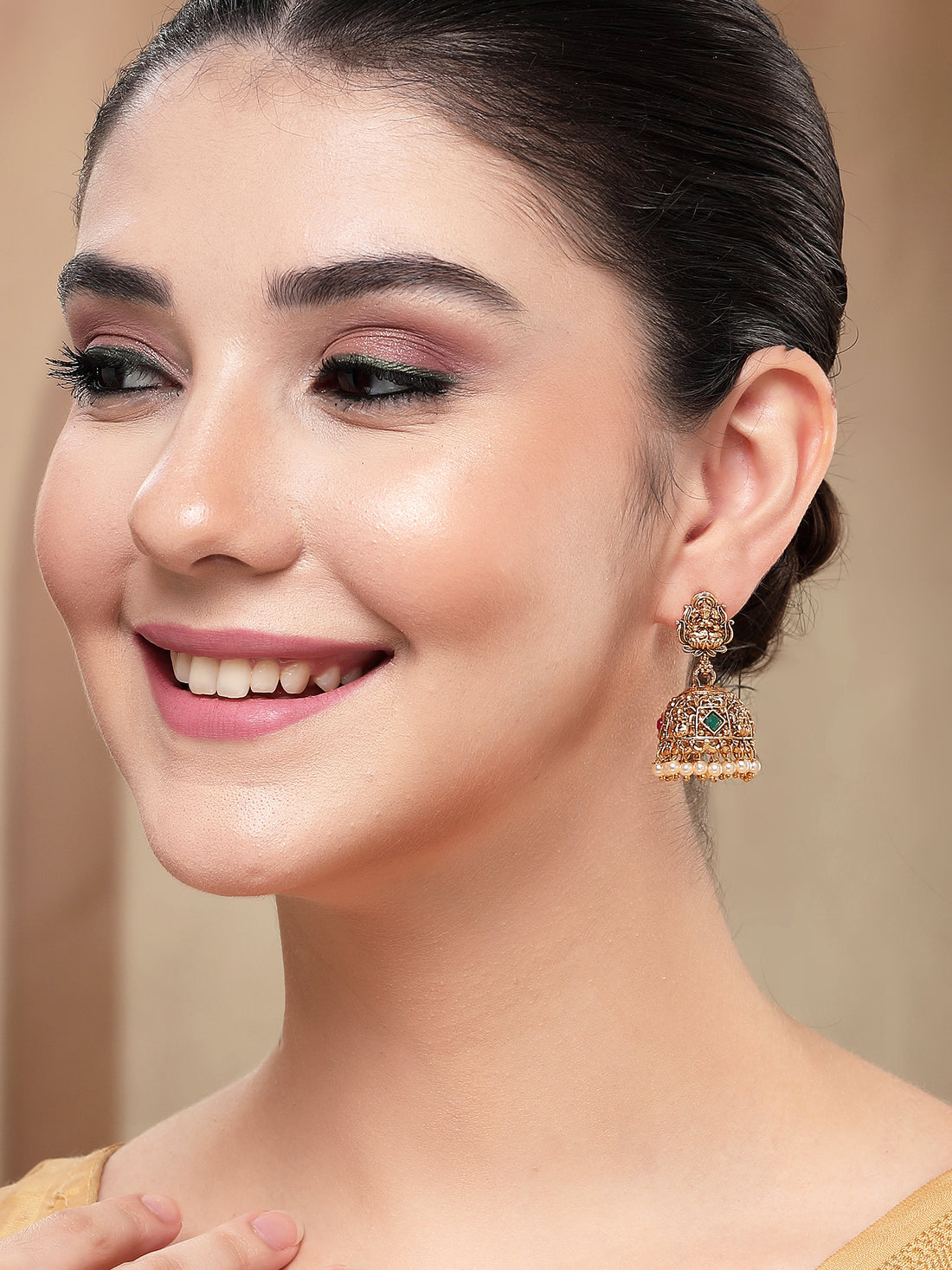 KARATCART Elegant Gold-Plated Lakshmi Mata Temple Jhumki Earrings for Women