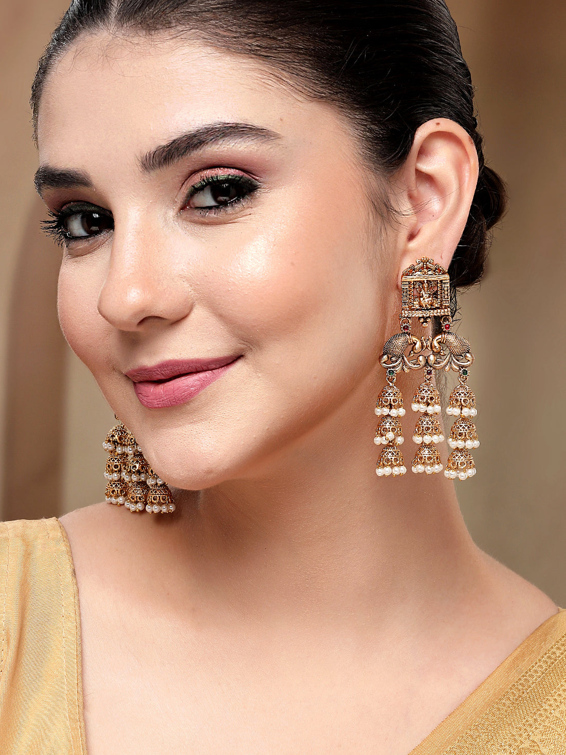 KARATCART Designer Gold-Plated Traditional Lord Ganesh Dome Jhumka Dangler Earrings for Women