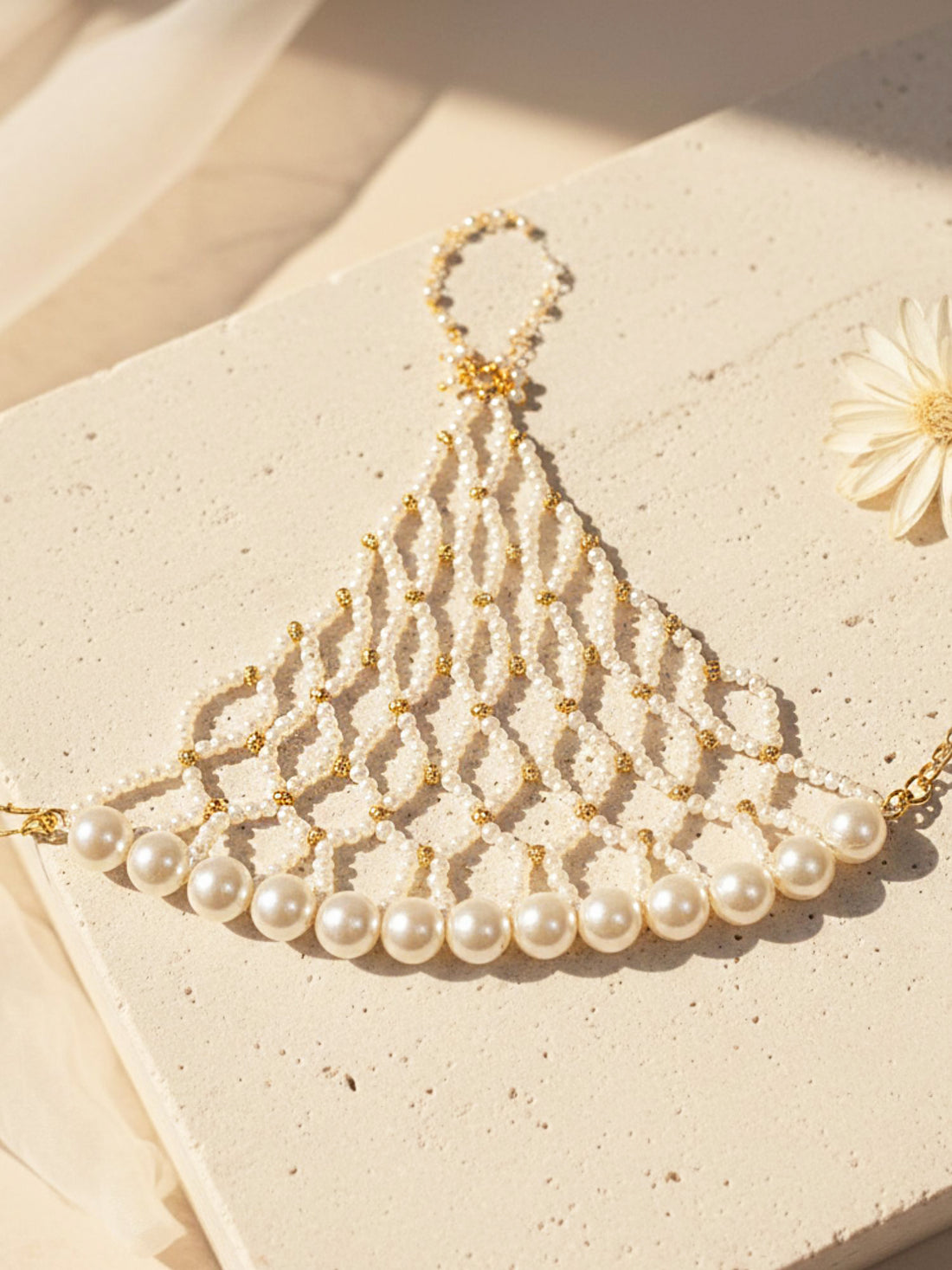 KARATCART Traditional Gold Tone Pearl Net Design Hathphool for Women