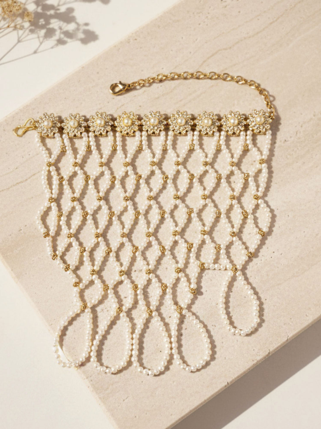 KARATCART Traditional Gold Tone Pearl Beaded Net Design Hathphool for Women