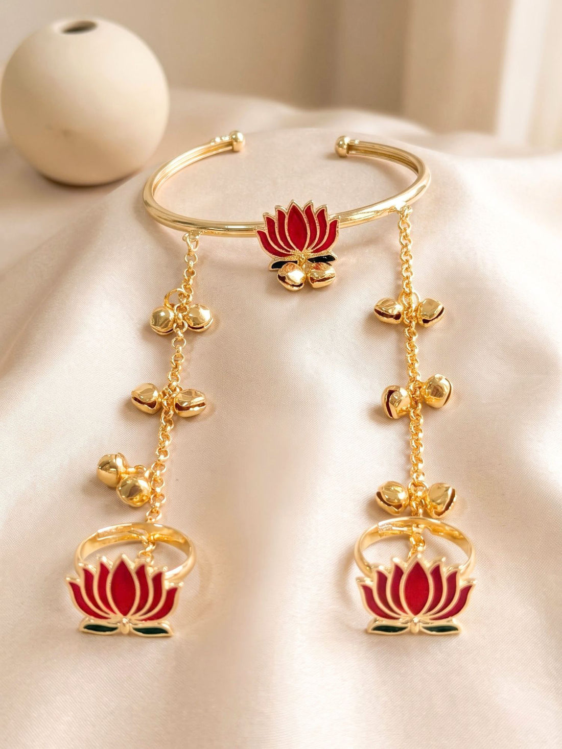 KARATCART Gold Tone Red Lotus Design Chain Hathphool Bracelet with Dangling Bell for Women