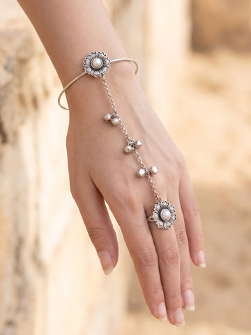 KARATCART Oxidised Silver Pearl Flower Chain Hathphool Bracelet with Bell Charms for Women