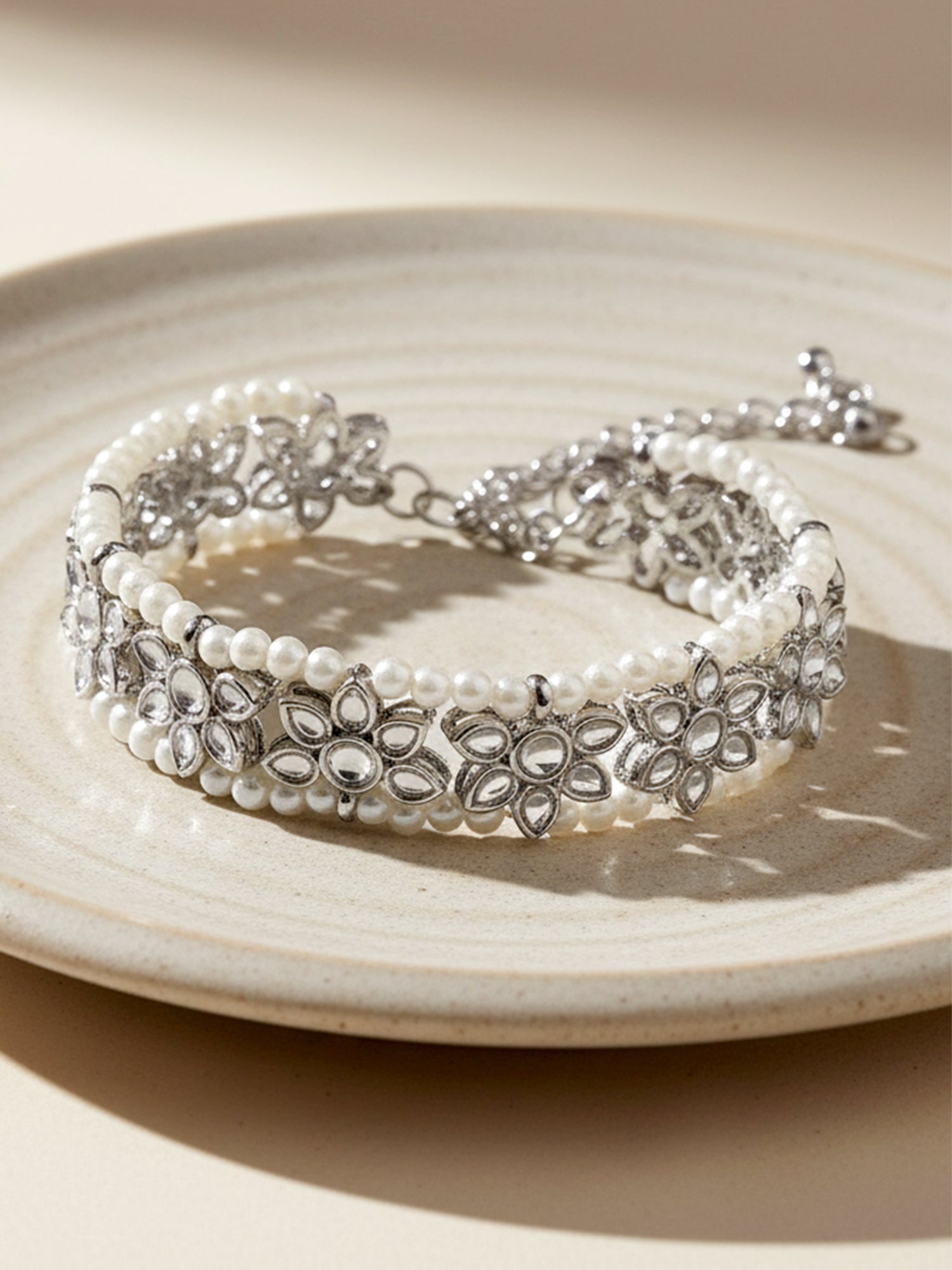 Women Silver-Toned & White Kundan Silver-Plated Wraparound Bracelet