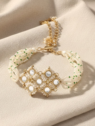 KARATCART Gold Plated Pearl Beaded Kundan Bracelet for Women