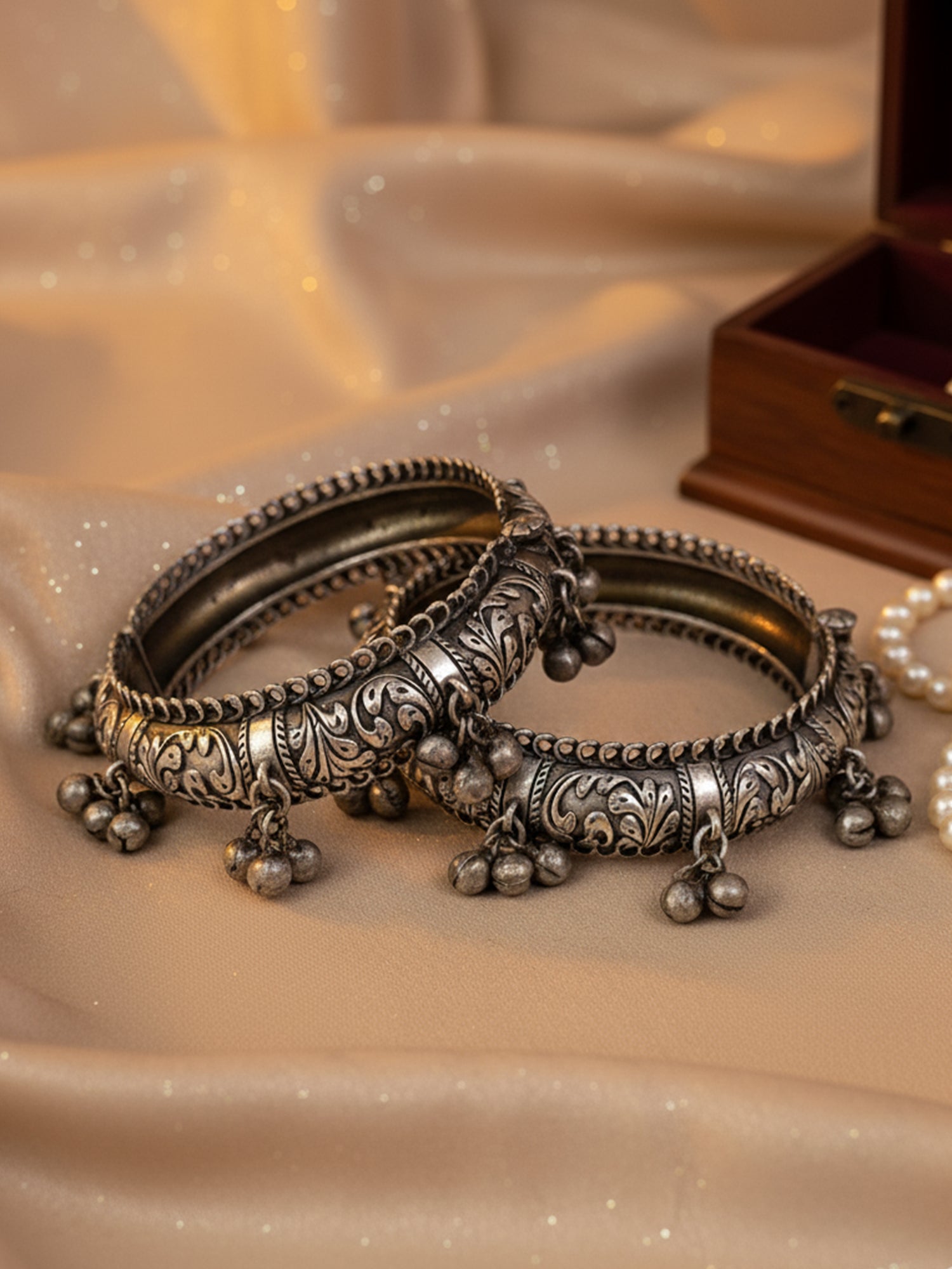 KARATCART Tribal Design Oxidized Silver Ghungroo Studded Engraved Bangles for Women
