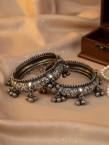 KARATCART Tribal Design Oxidized Silver Ghungroo Studded Engraved Bangles for Women